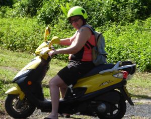 Rosemary has hired a scooter to get around rarotonga