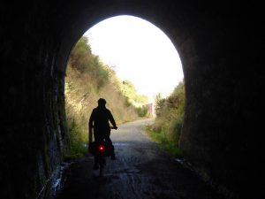 Cycling through the tunnel near Lawrence on Clutha Gold Trail